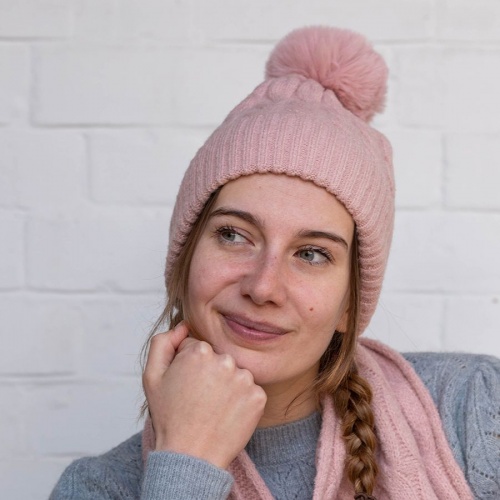 50% recycled pale pink cable knit and faux fur bobble hat by Peace of Mind